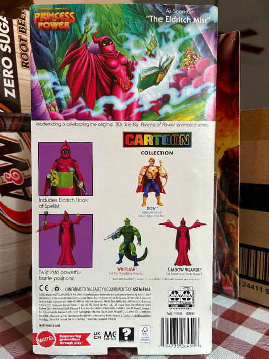 Toy action figure packaging with colorful illustrations on a checkered surface