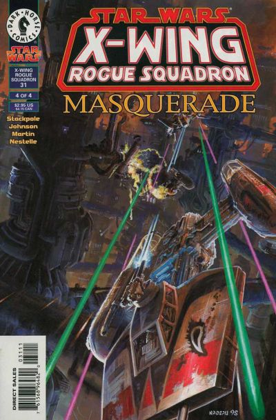 Comic book cover of 'Star Wars: X-Wing Rogue Squadron Masquerade' featuring a spaceship and laser beams.